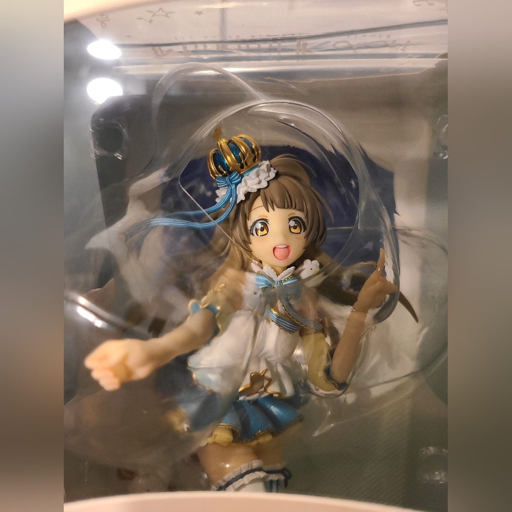 Anime Figure with Blue and Gold Accents